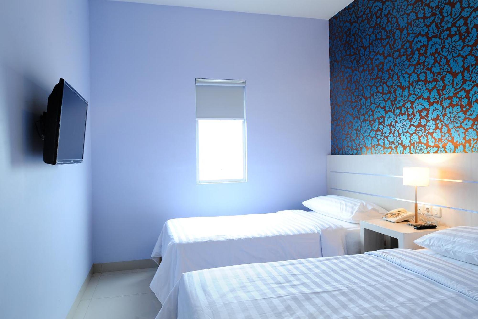 Cordela Hotel Medan Rum bild